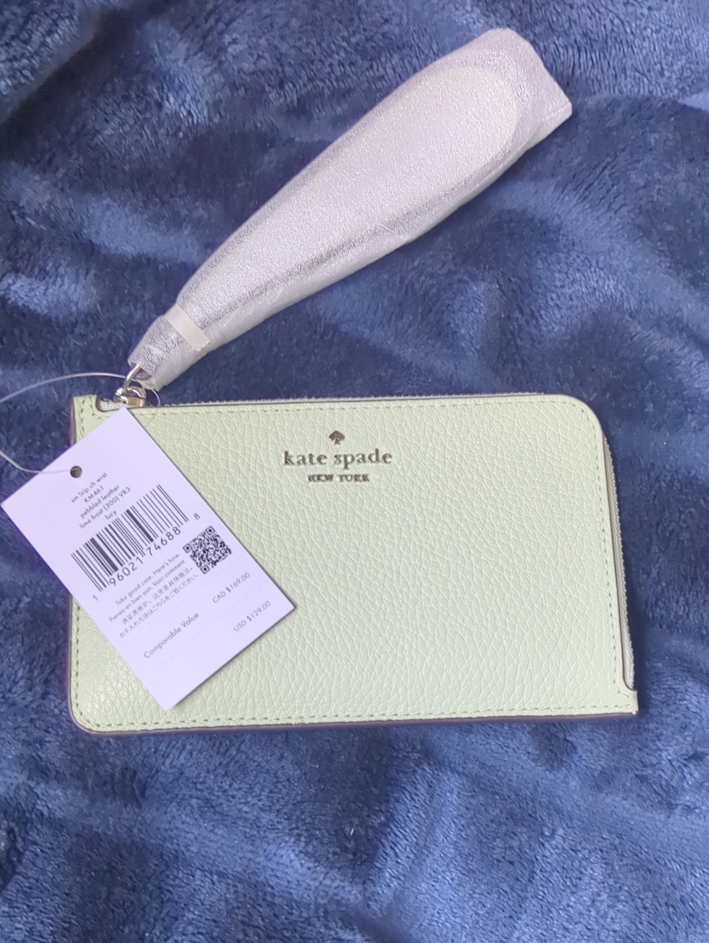 kate spade mint green wristlet clutch with silver logo